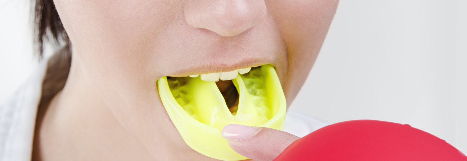 Woman with mouthguard